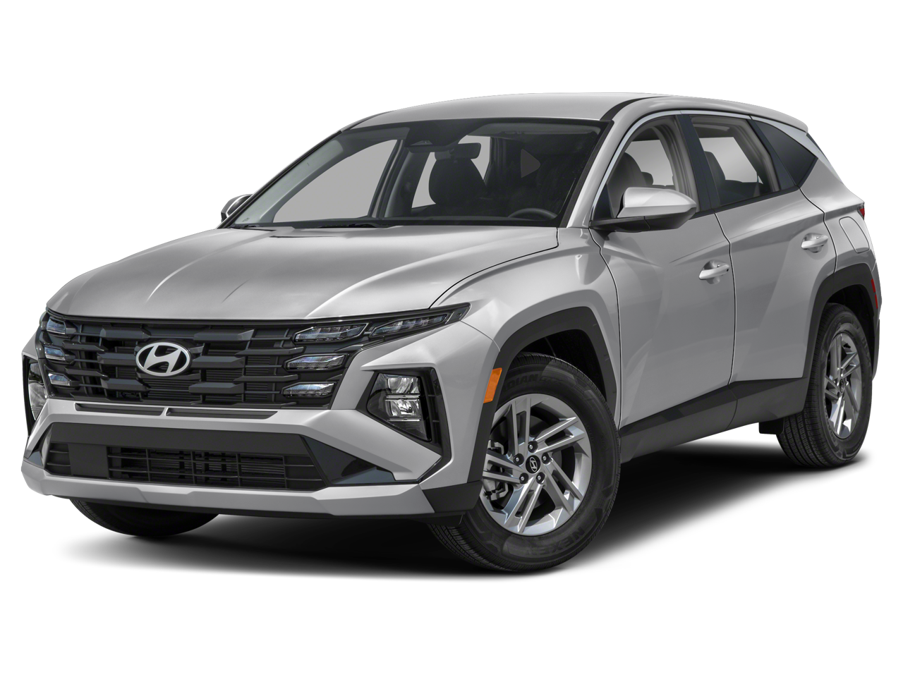 2026 Hyundai TUCSON SE in White Pearl — front three-quarter view