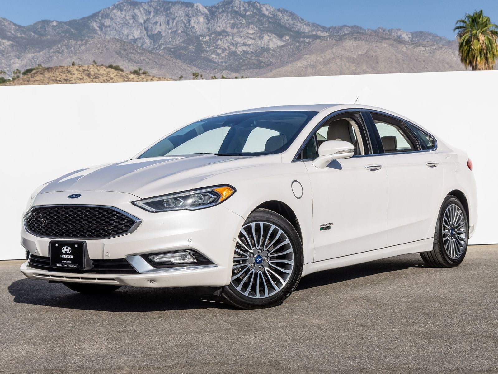 2017 Ford Fusion Energi Platinum in White Platinum Clearcoat Metallic — front three-quarter view