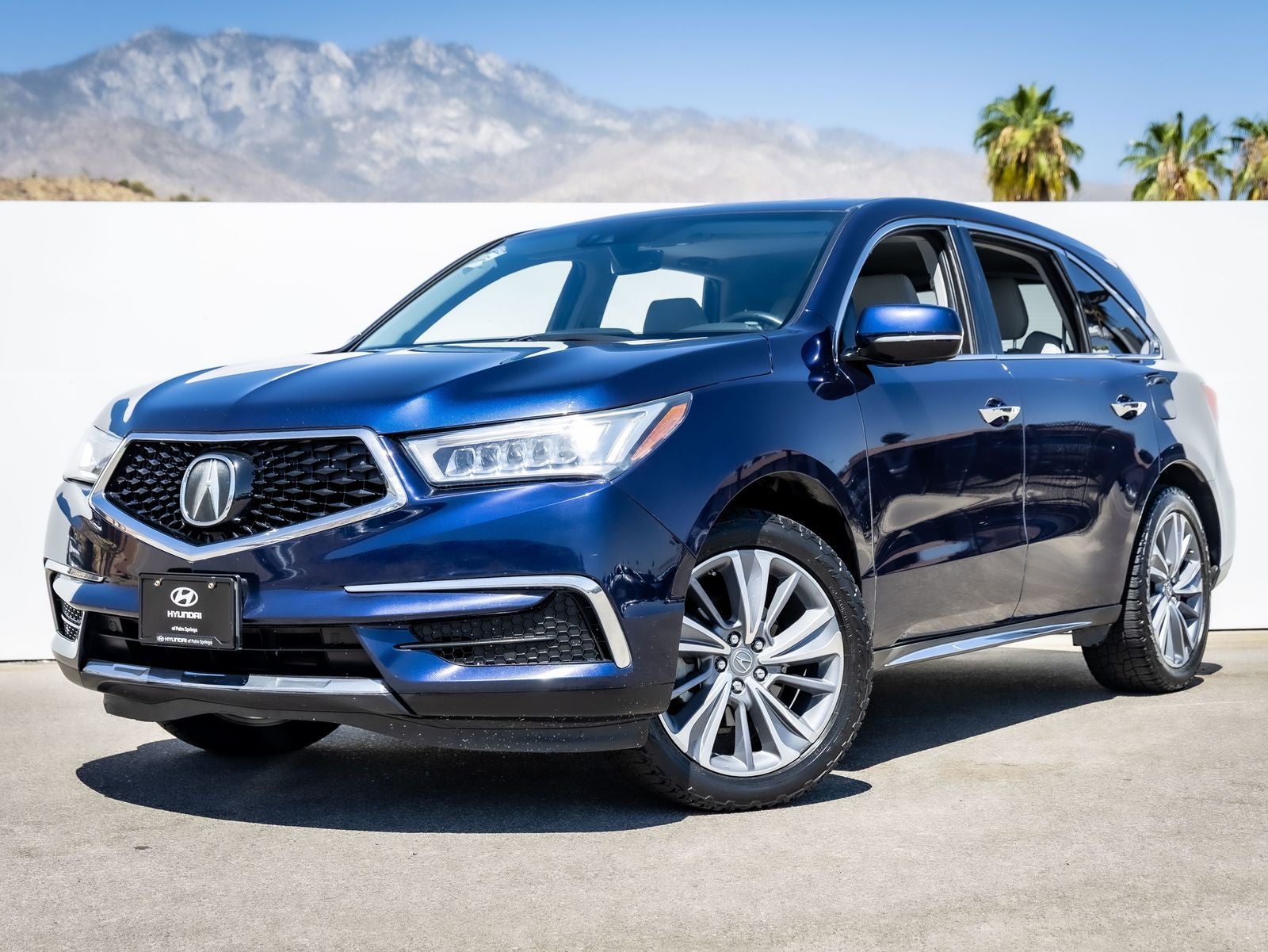 2017 Acura MDX 3.5L SH-AWD w/Technology Package in Fathom Blue Pearl — front three-quarter view