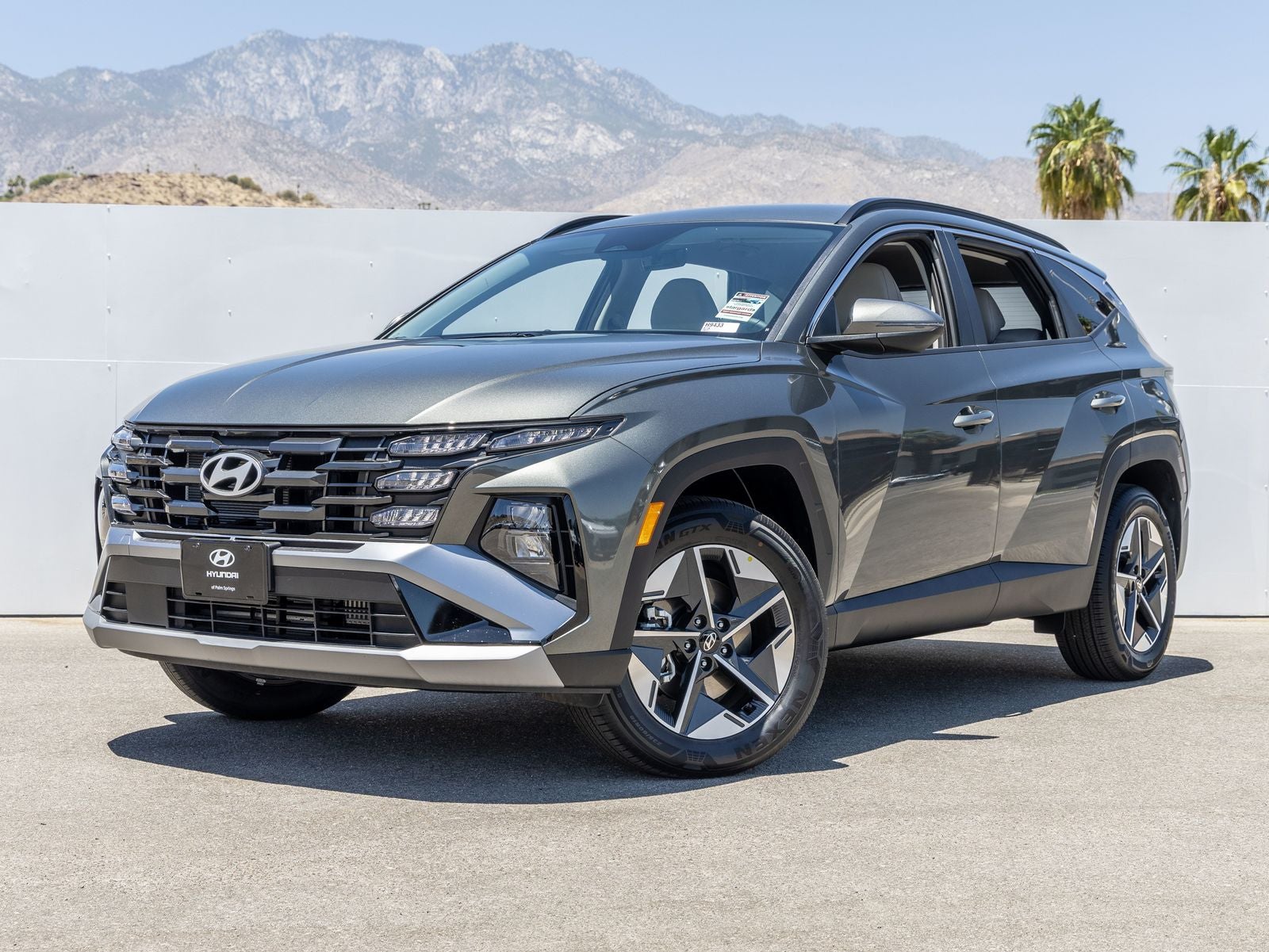 2026 Hyundai TUCSON HYBRID SEL Convenience in Amazon Gray — front three-quarter view