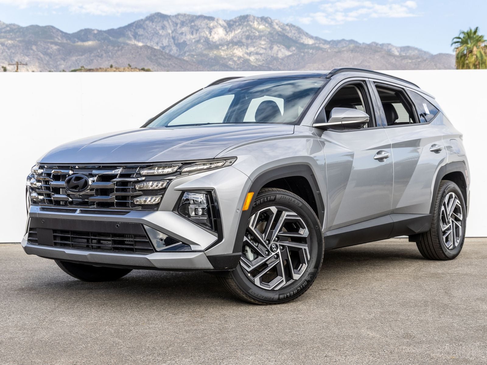2025 Hyundai TUCSON HYBRID Limited in Shimmering Silver — front three-quarter view