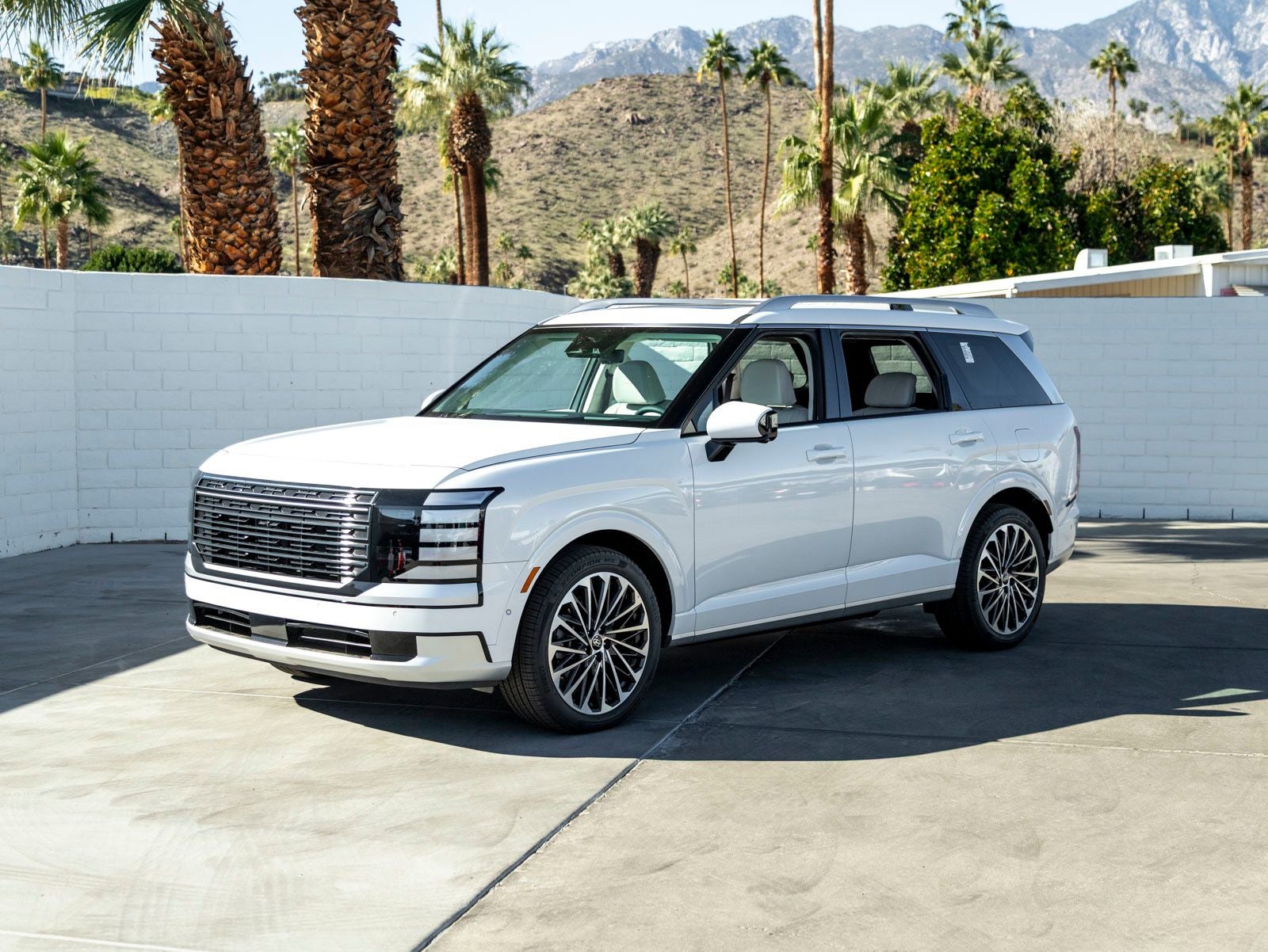 2026 Hyundai PALISADE Calligraphy in Creamy White Pearl — front three-quarter view